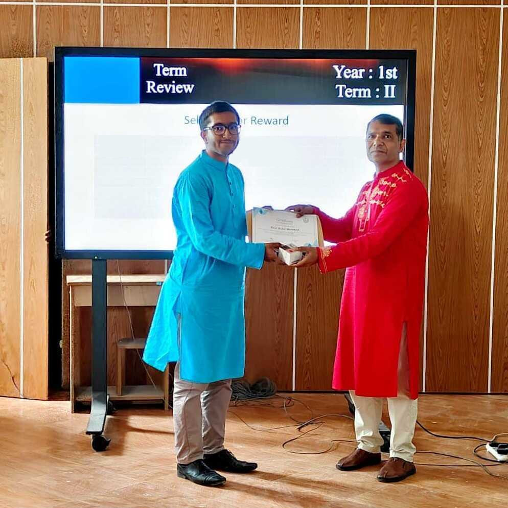 Receiving Certificate and Award for standing first in 1st year 1st term final examination from Head of the Discipline/Department, Dr. Abu Shamim Mohammad Arif Sir [March 2024]